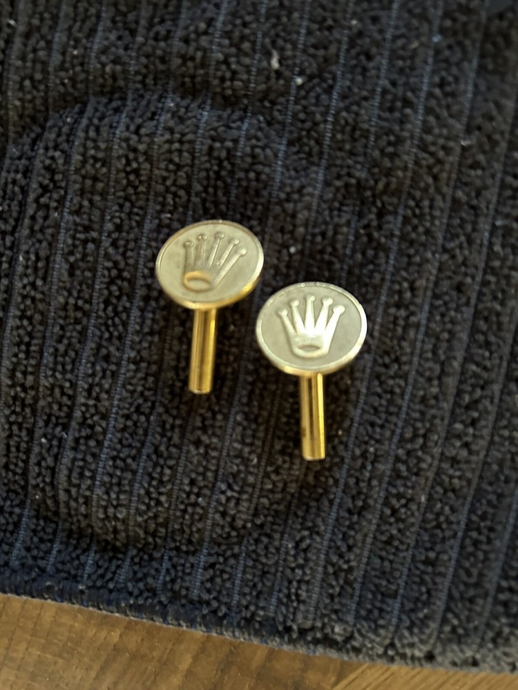 Rolex watch display case brass golf tee’s .