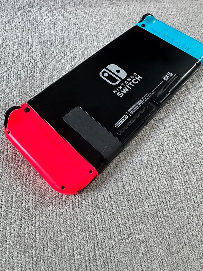 Nintendo Switch Console Plus Neon Red and Neon Blue Joy-Con set
