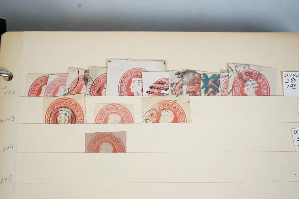 US COLLECTION OF 1,200+ STATIONERY CUT SQUARE STAMPS STORED IN STOCKBOOK