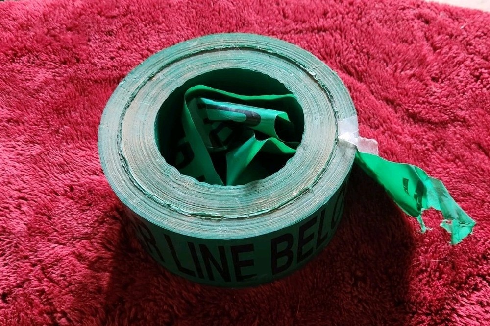 Partial Roll Sewer Line Below Caution Tape 3 Inch Green