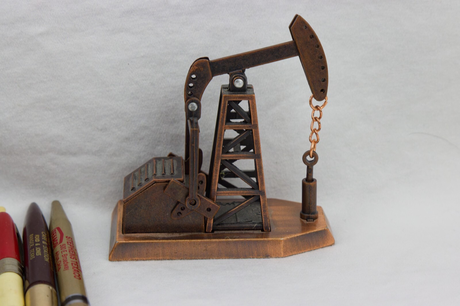 Oil, Trucking and Land Advert Items; Wood Box, Pencil Sharpener and Pens/Pencils