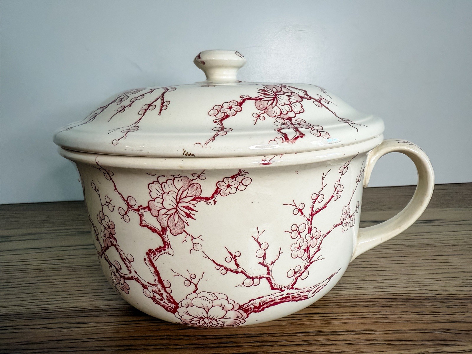 Antique Chamber Pot With A Red Transferware Pattern