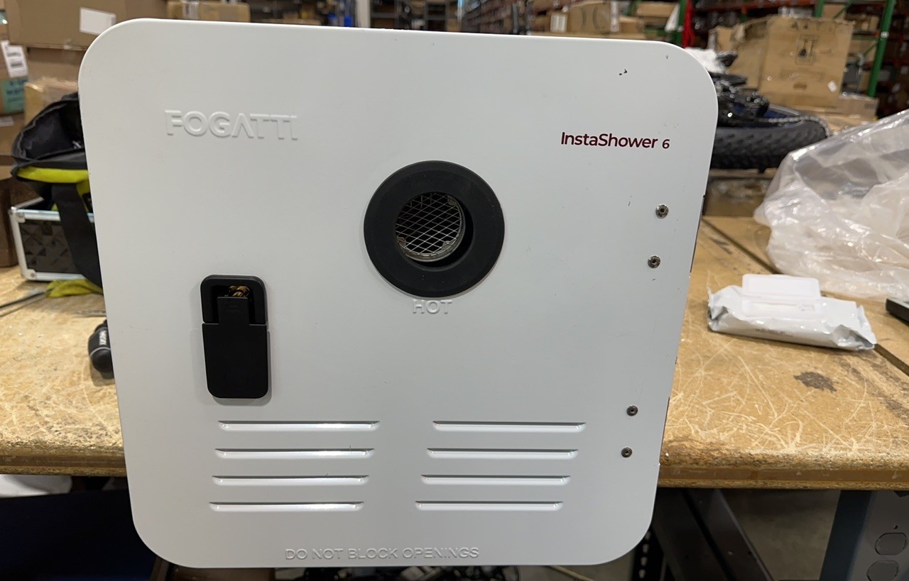 Used 2.5GPM 48,000 BTU RV Tankless Water Heater with 15x15 White Door