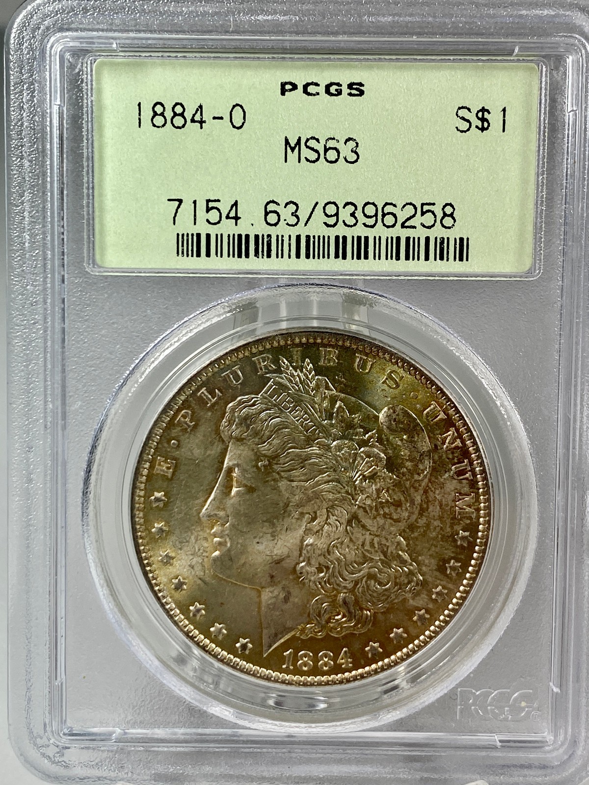 1884-O Morgan Silver 1$ Dollar PCGS MS 63 OGH Yellow with Blue Toned