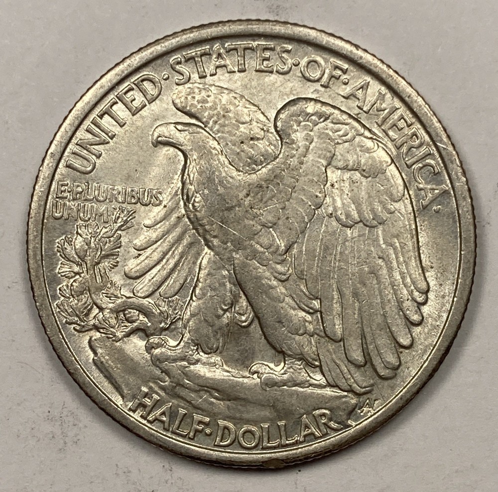 1935 Walking liberty Half .50. AU with Luster.