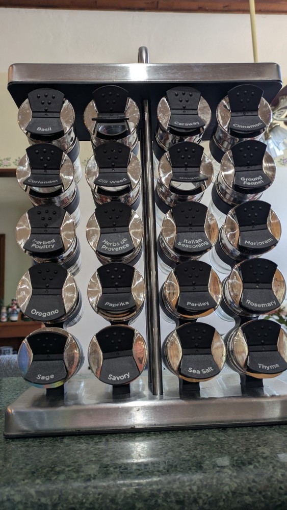 Space Saving Spice Rack with 20 Labeled Jars.