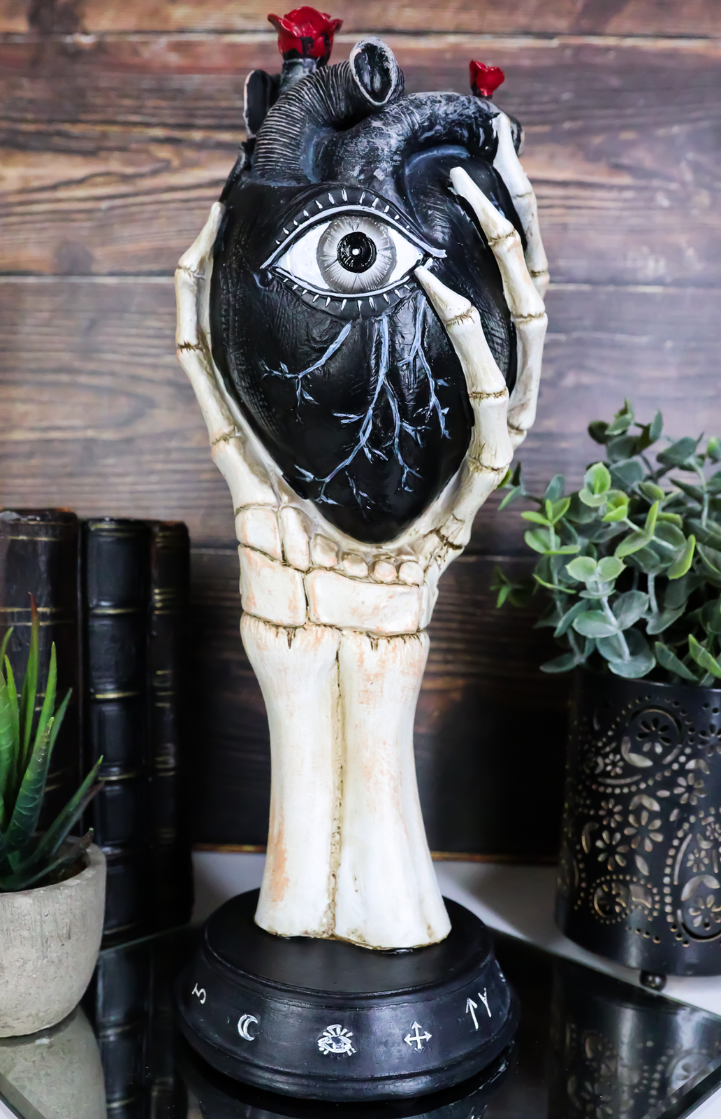 Gothic Alchemy Skeleton Hand Holding Black Anatomy Heart With Evil Eye Figurine