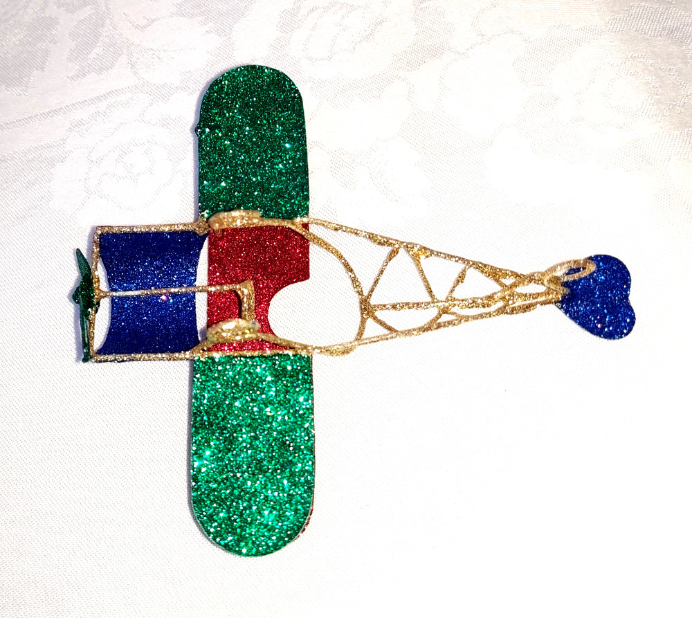 PIER ONE GLITTERED PLANE ORNAMENT