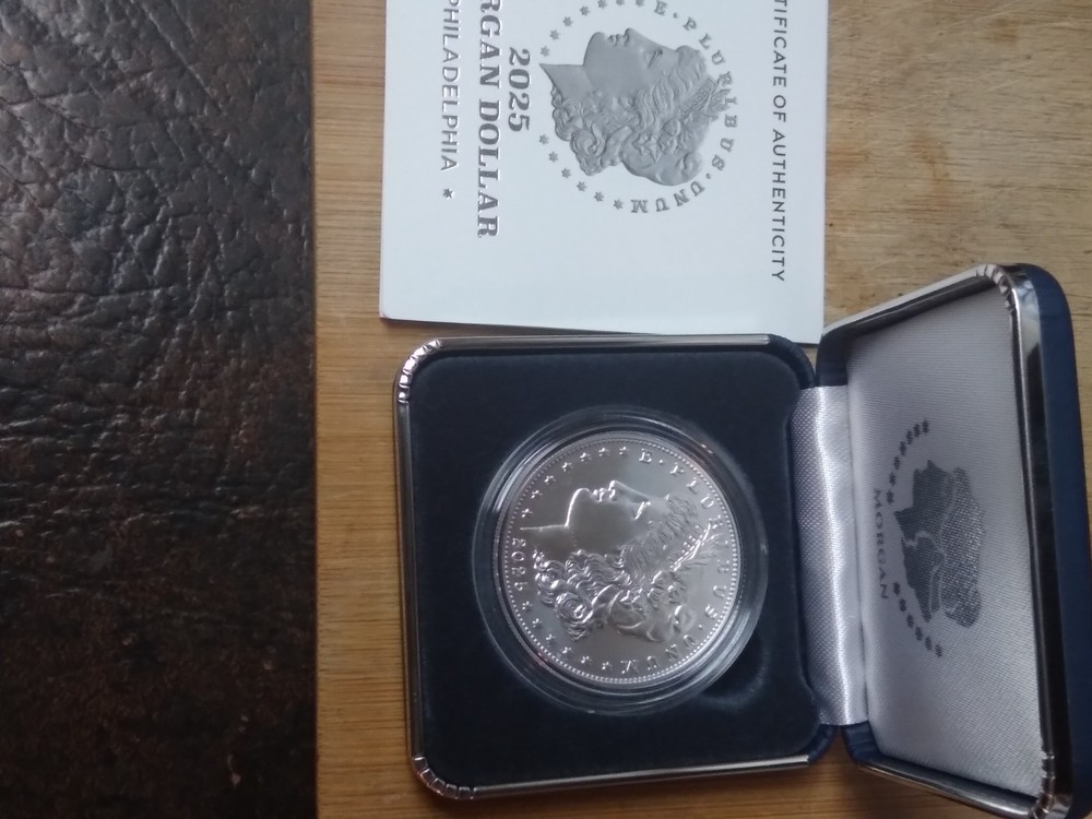 2025 P Morgan Silver Dollar Uncirculated with box, case, and coa