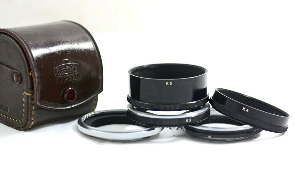 NIKON 5PC K EXTENSION RING SET WITH LEATHER CASE AND INSTRUCTIONS (EXCELLENT)