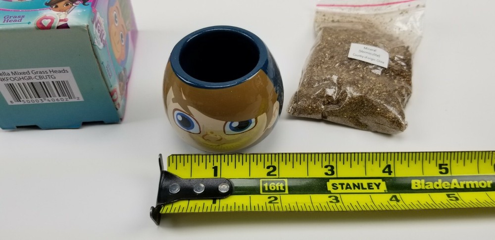 Nella Garret Grass Head