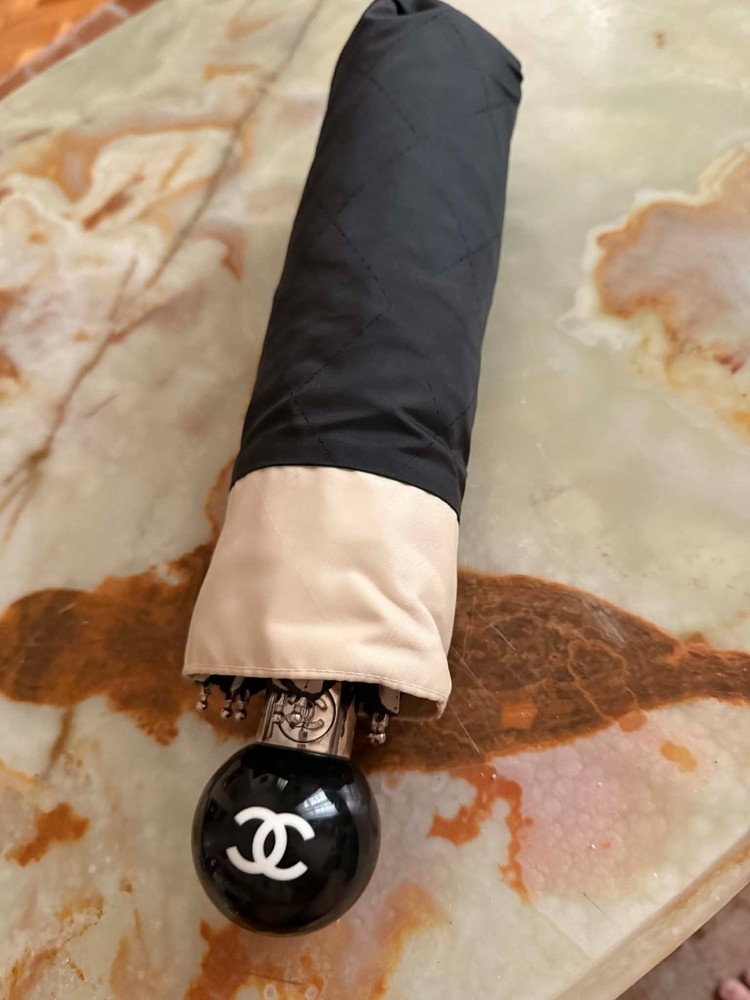 Rare vintage authentic Chanel umbrella – chic statement piece