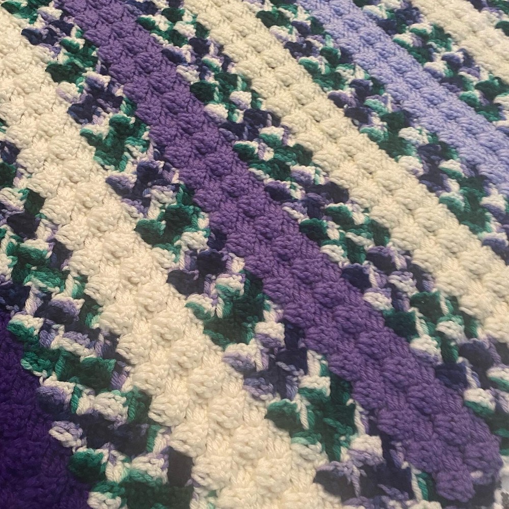 Beautiful crocheted afghan 63 x 50