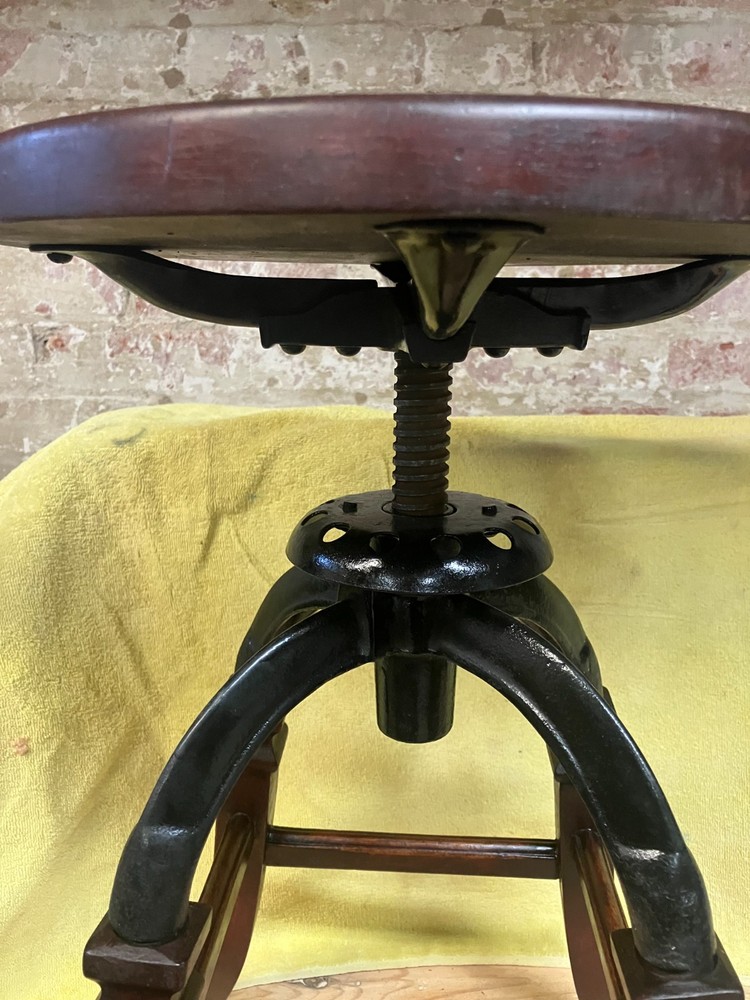 Antique wood and iron work stool