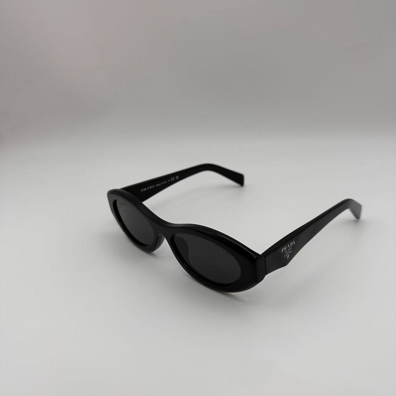PRADA SPR26Z Black Sunglasses Polished Black Gray Tint Silver Logo