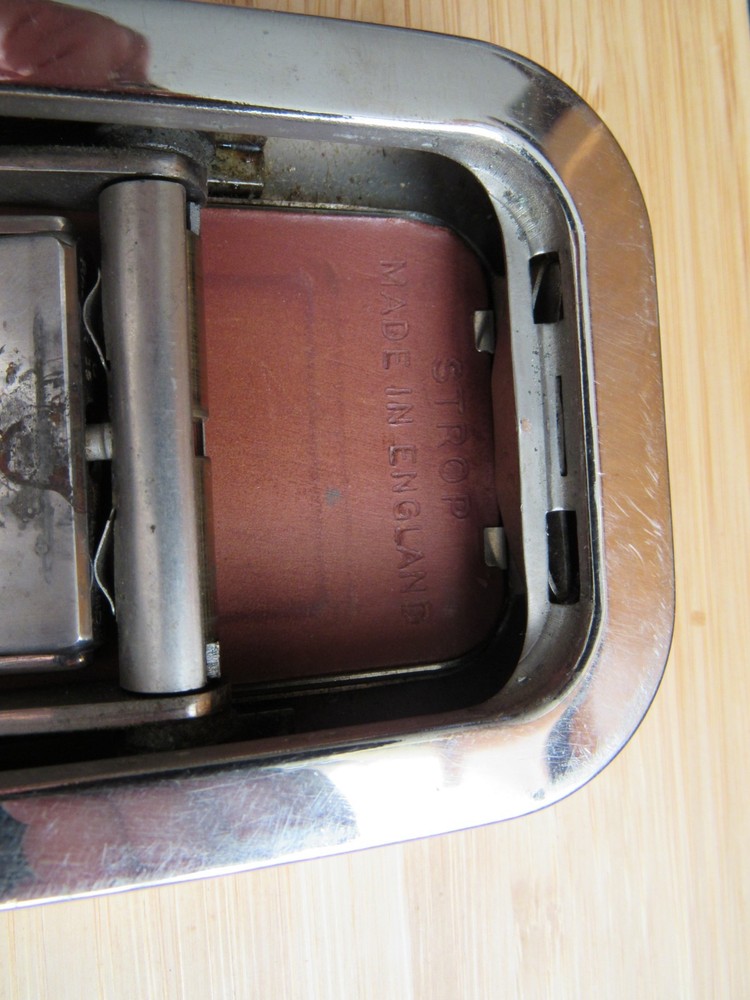 Antique Rolls Razor