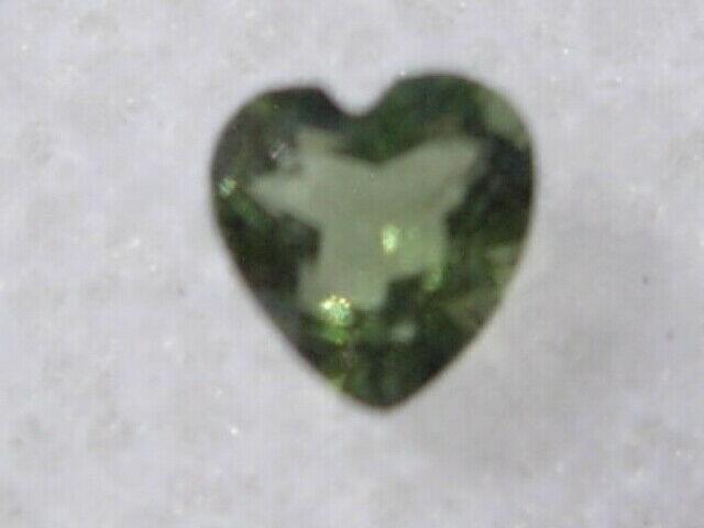 .116 carat Moldavite Faceted Heart Czech Republic Meteorite impact about 3x3x2mm