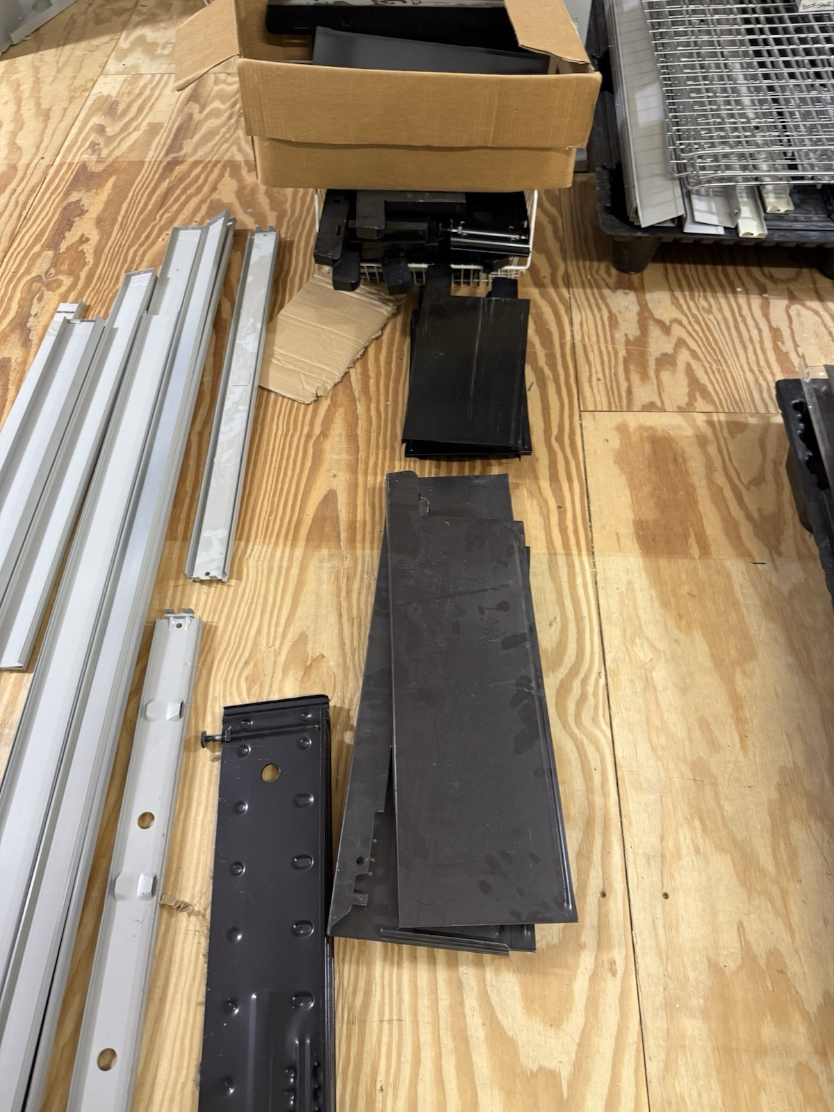 HUGE lot of pallets of Used Lozier Shelving shelves, components, glass cases