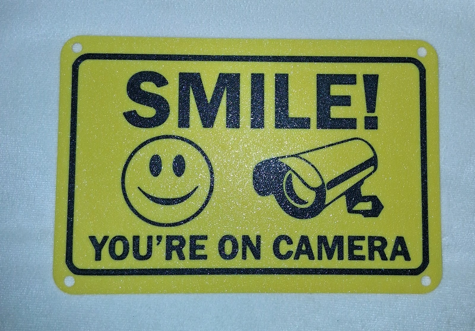 Smile You're on Camera Sign 6"x9" Plastic