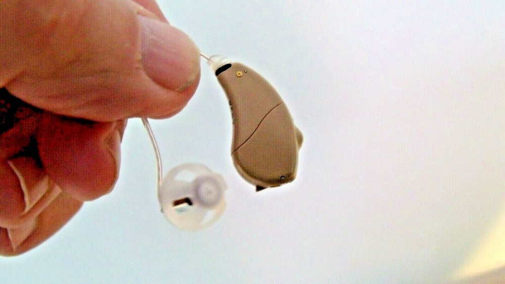 DIGITAL RIC mini HEARING AID LEFT ear, we program 4 modes 2 mics noise reduct