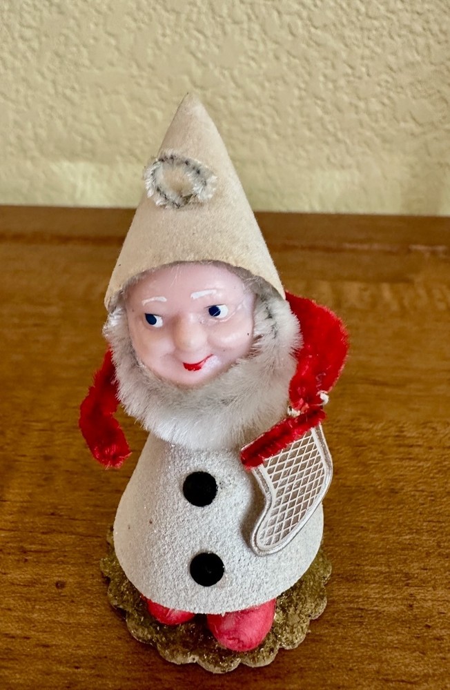 VINTAGE CHRISTMAS ELF HOLDING STOCKING