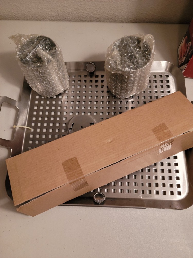 Sur La Table adjustable grilling grid and poultry roaster.