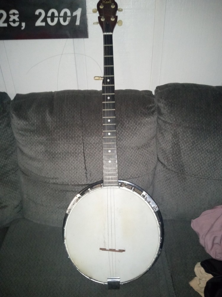 Kent Brand Banjo (missing one string) Case is an extra $5