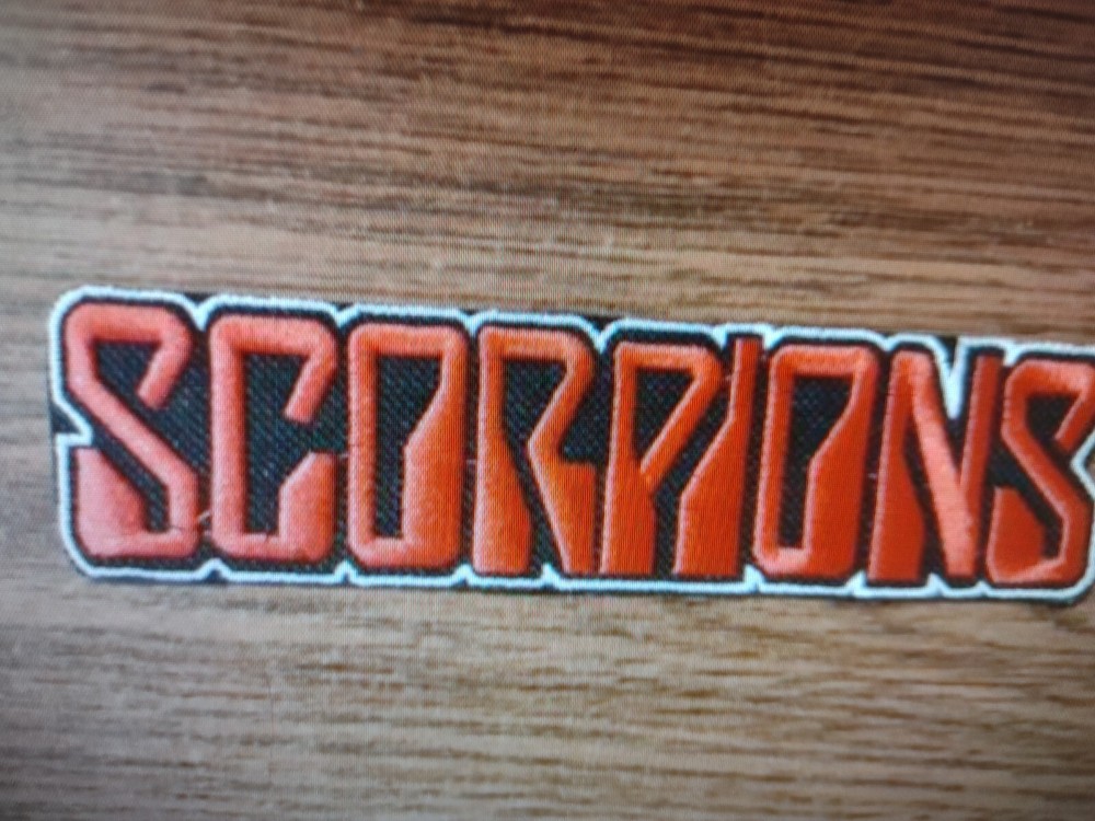 SCORPIONS.IRON ON RED WITH WHITE BORDER EMBROIDERED PATCH
