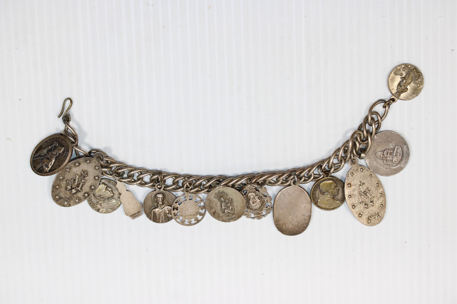 Vintage Sterling Silver Saint Charm Bracelet featuring 13 Medals 60g #450