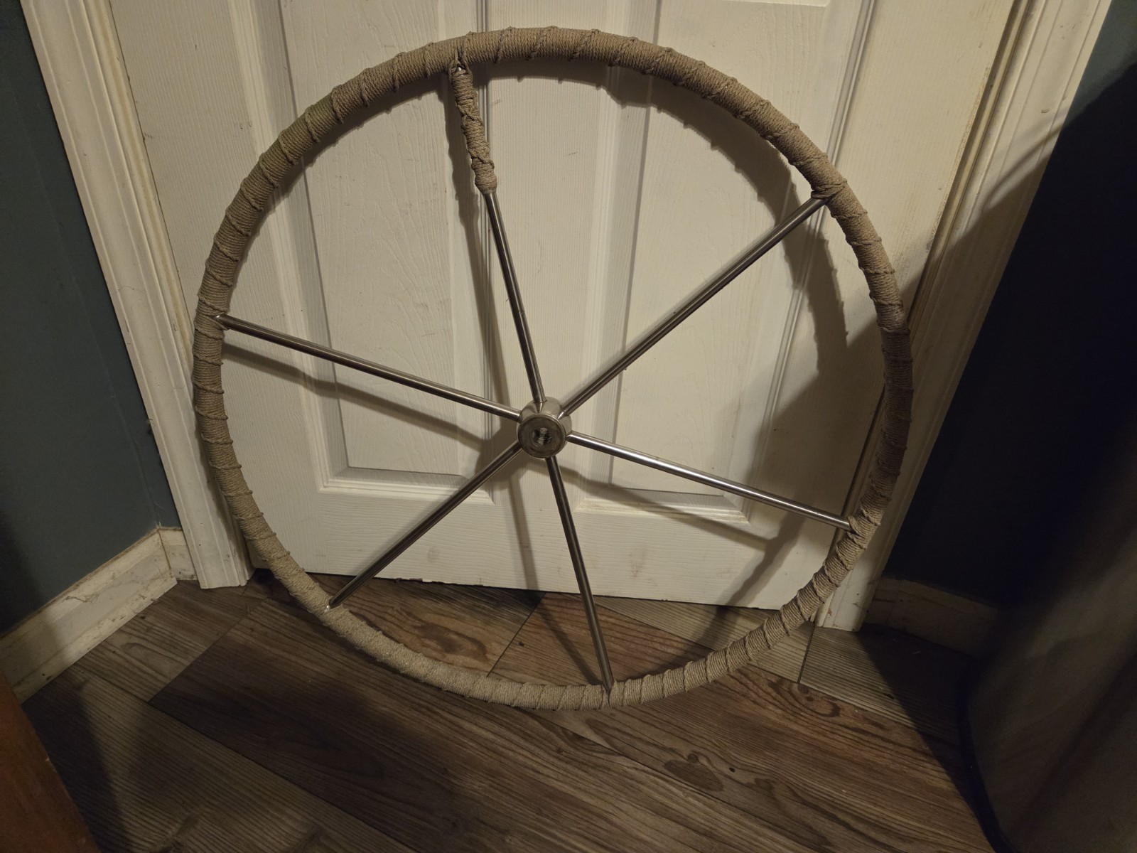 stainless steel sailboat steering wheel, sometimes called a destroyer wheel