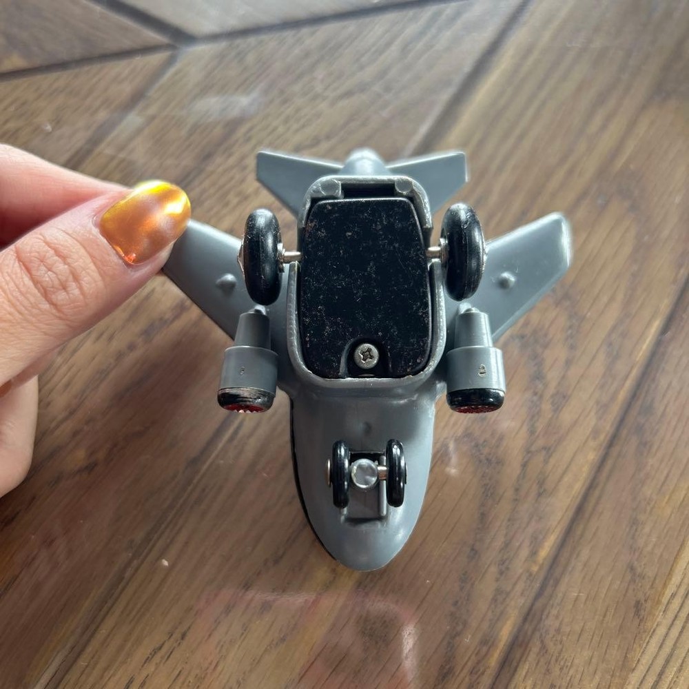 TDA miniature airplane tin