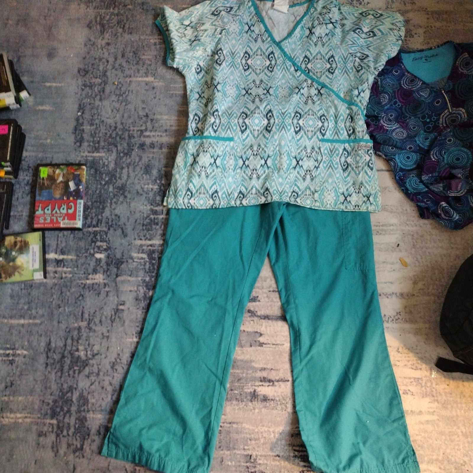SET OF 2SCRUB TOPS AND MATCHING PANTS FOR BOTH IN MED.