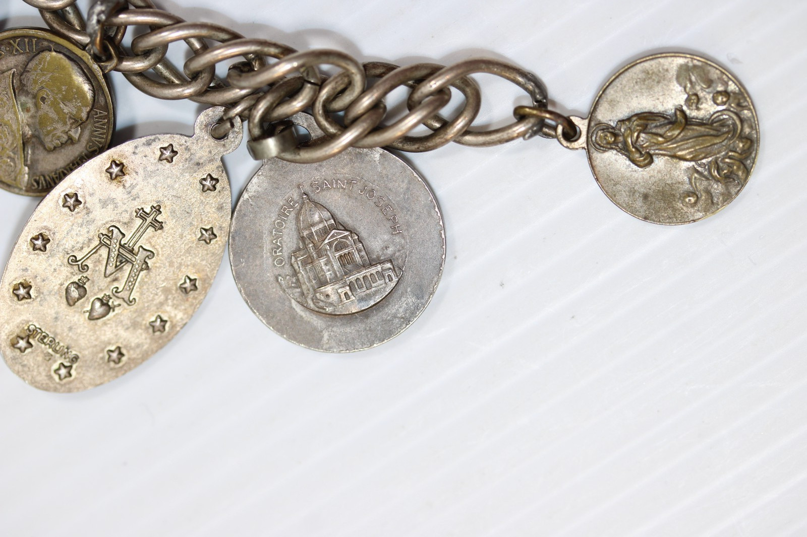 Vintage Sterling Silver Saint Charm Bracelet featuring 13 Medals 60g #450