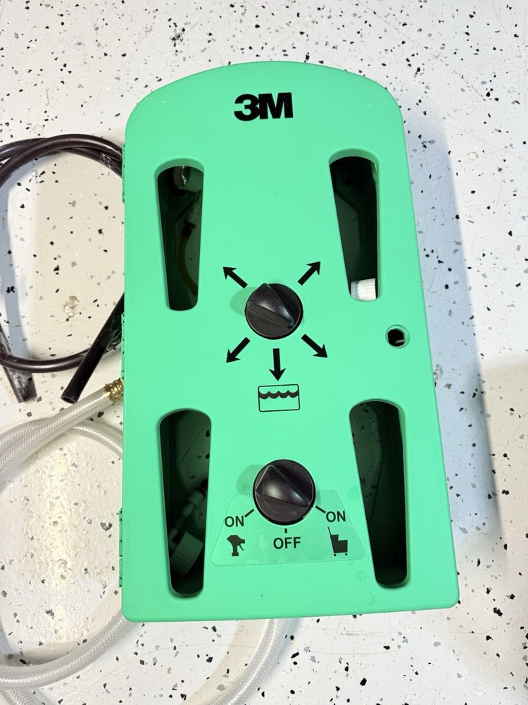 3M Flow Control System chemical dispenser, a wall-mounted.