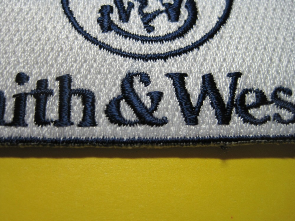 SMITH & WESSON FIREARMS VEST PATCH WITH HOOK BACK! 2 X 4 INCH GUN PATCH LOOK