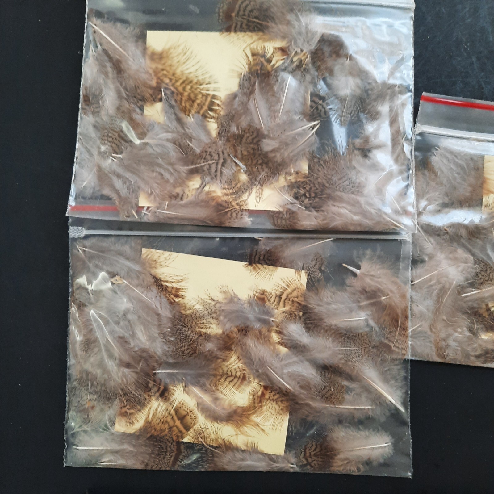 Three packs Brown and Gray Partridge Soft Hackle Feathers
