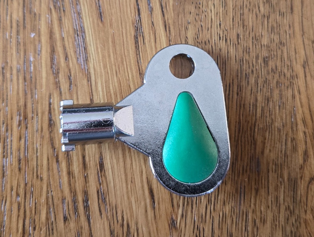 Pachislo slot machine door key with the code A102