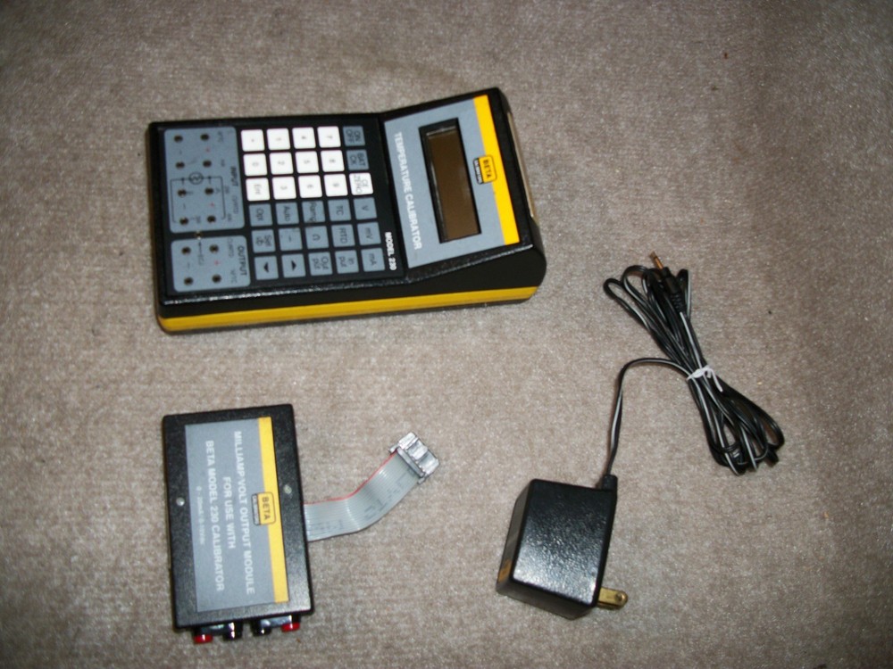 BETA TEMPERATURE CALIBRATOR MODEL 230 W/ CHARGER AND OUTPUT MODULE