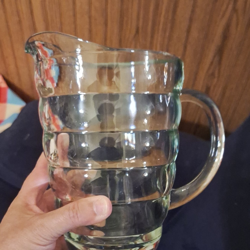 Clear Glass Pitcher Ribbed Design Round Shape Glossy Finish Solid Pattern Handle