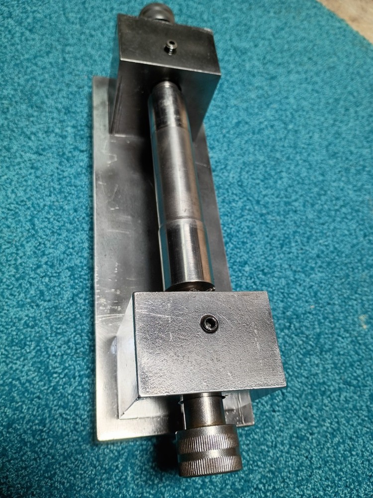 Steel Rectangular Fixture Block with Rotating Shaft and Threaded Collars, 30cm