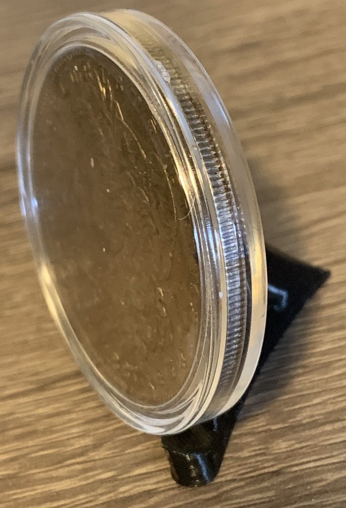 1887 Morgan silver dollar In Plastic Case