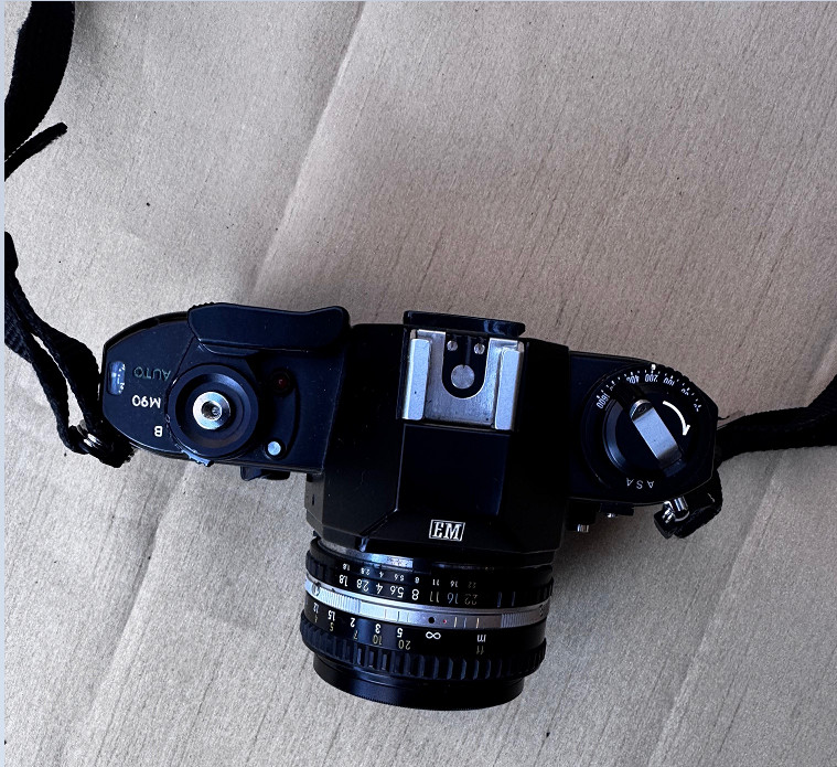 Nikon EM -35mm Camera and Nikon SB-E Flash with cases