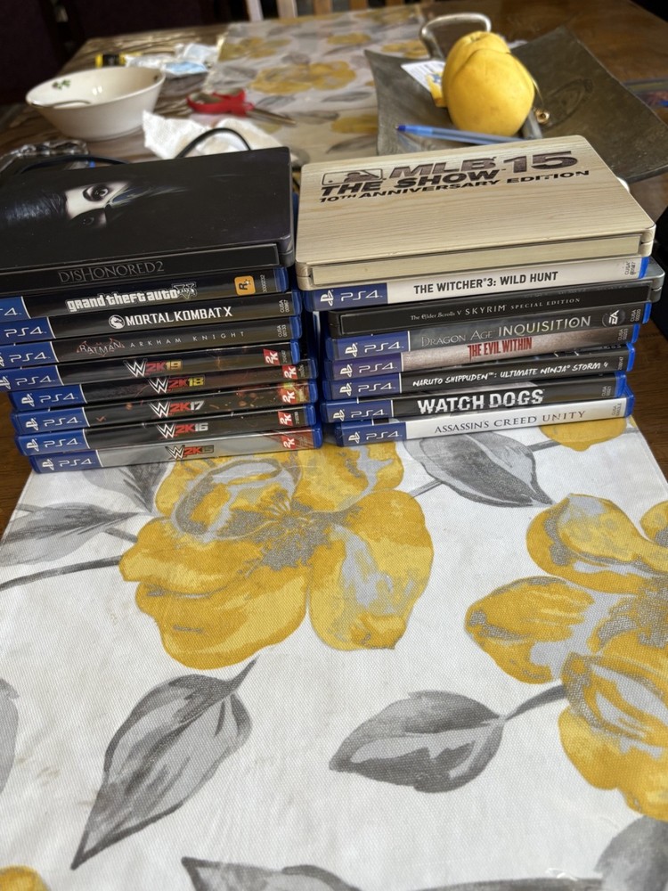 Sony PlayStation 4 1TB Bundle with Controller, Cords, and Games