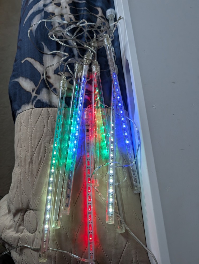 PREOWNED OMGAI LED METEOR LIGHTS SET 8 TUBES MULTI COLORED 2 SETS LINKABLE