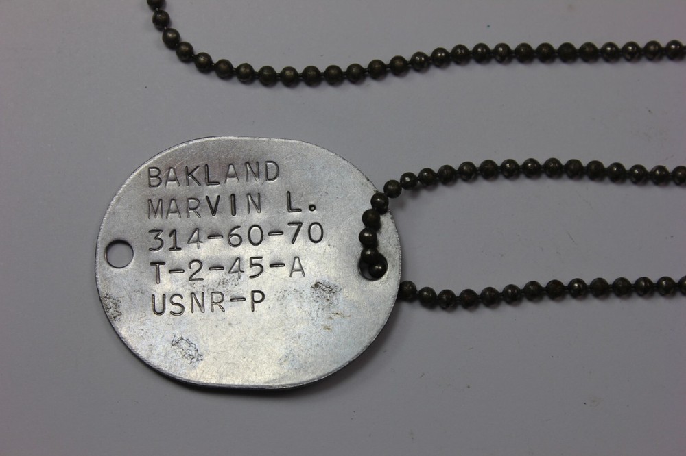 World War II USNR USN US Navy Oval Dog Tag Dated 2-1945