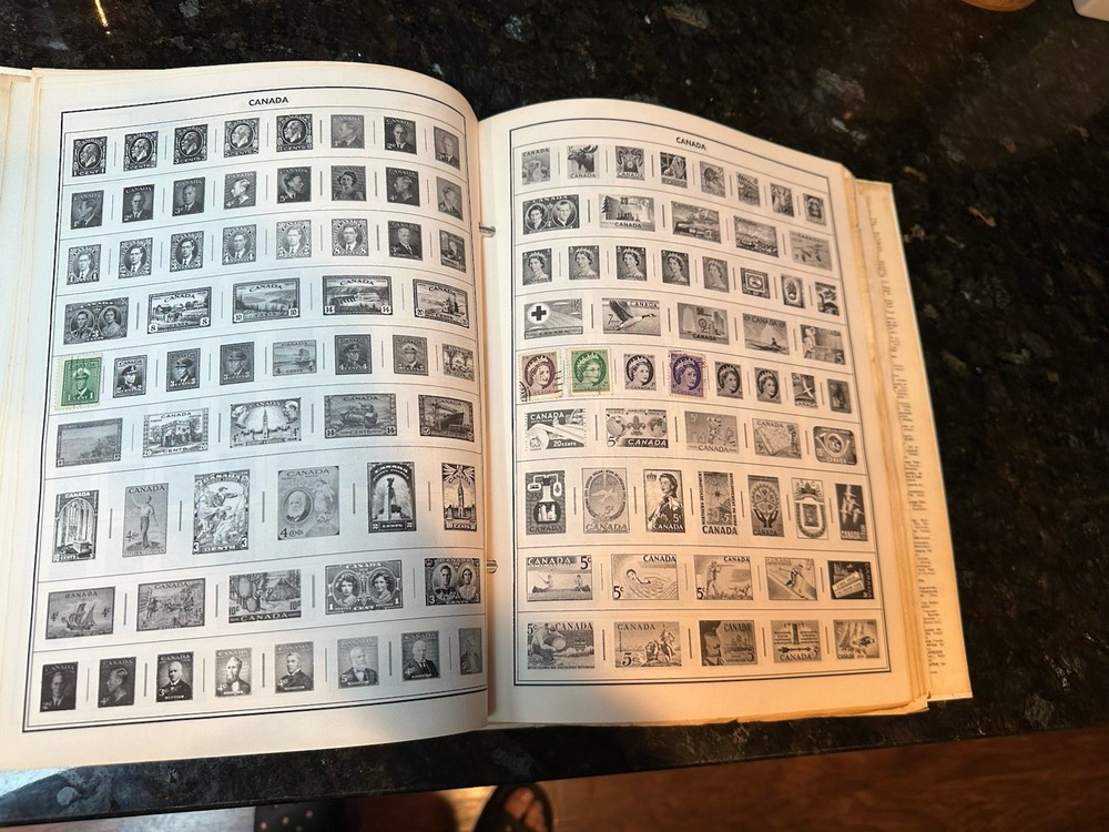 VTG 1977 Traveler Stamp Album With Many Stamps.