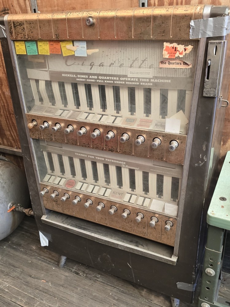 Antique cigarette vending machine