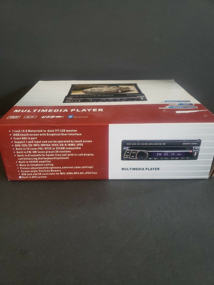 Auto multimedia player. New open box. 7" touch screen. See description