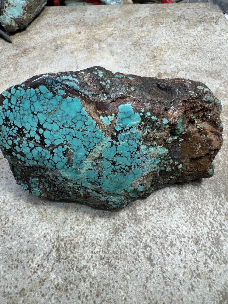 Hubei turquoise stabilized nugget solid spiderwebs all the way through