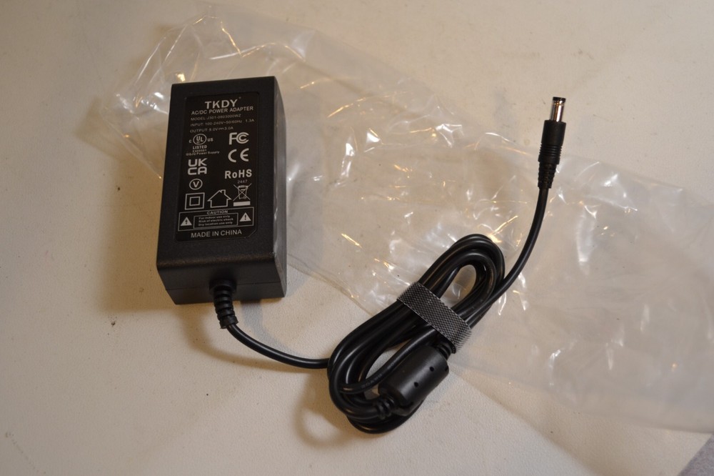 TKDY J301-0803000WZ AC/DC Power Adapter